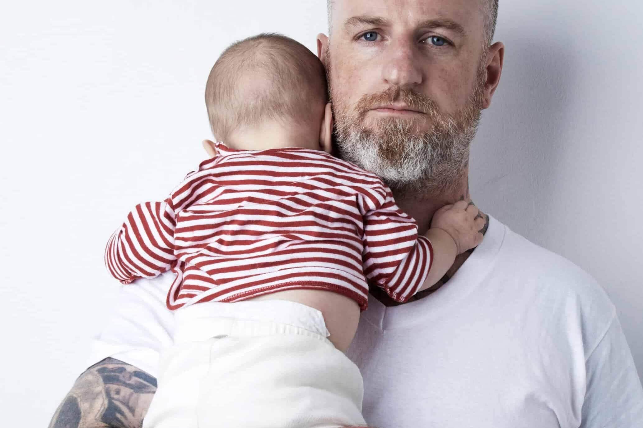 Father holding baby